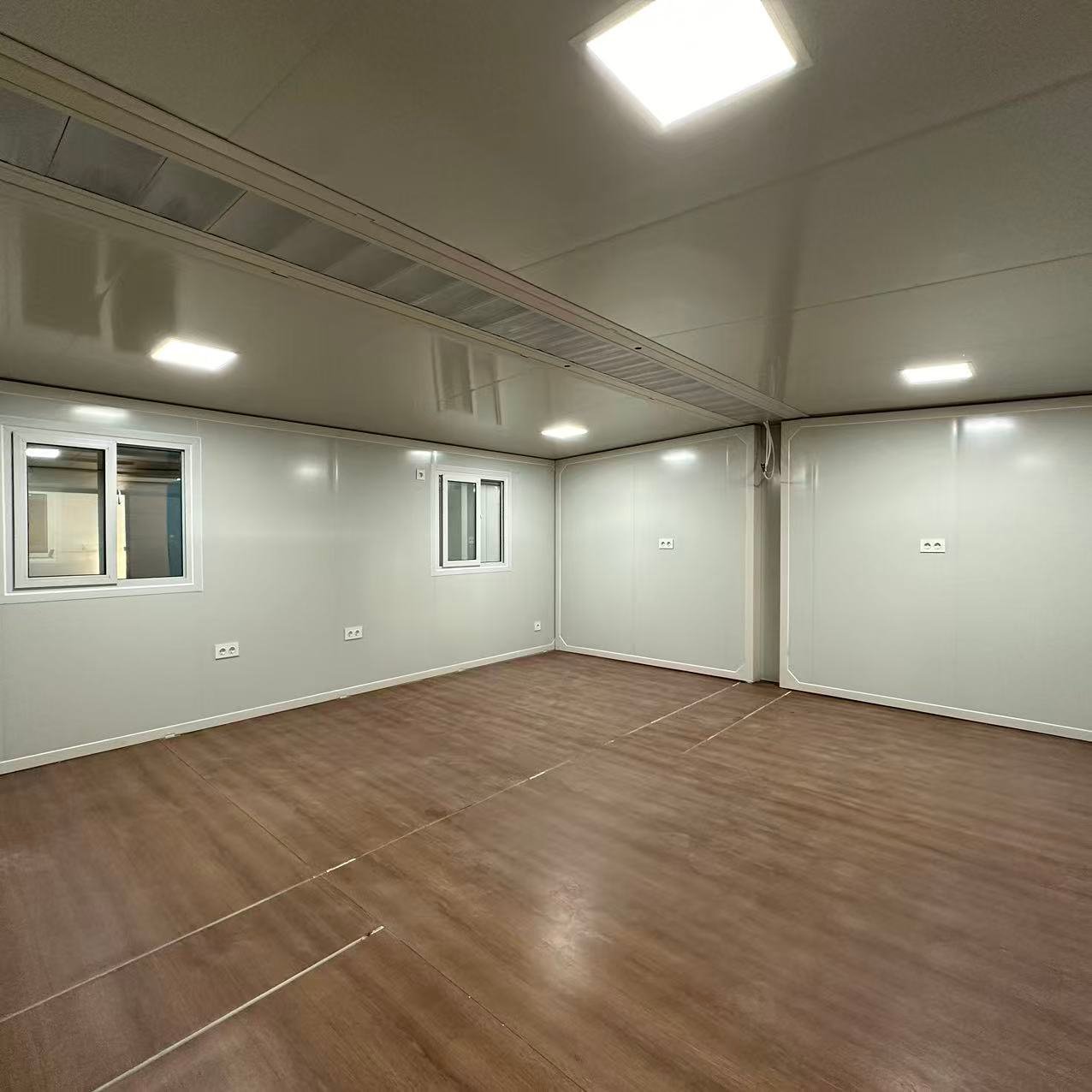 Caseta Modelo D 30m2 interior, salón vacío con cocina